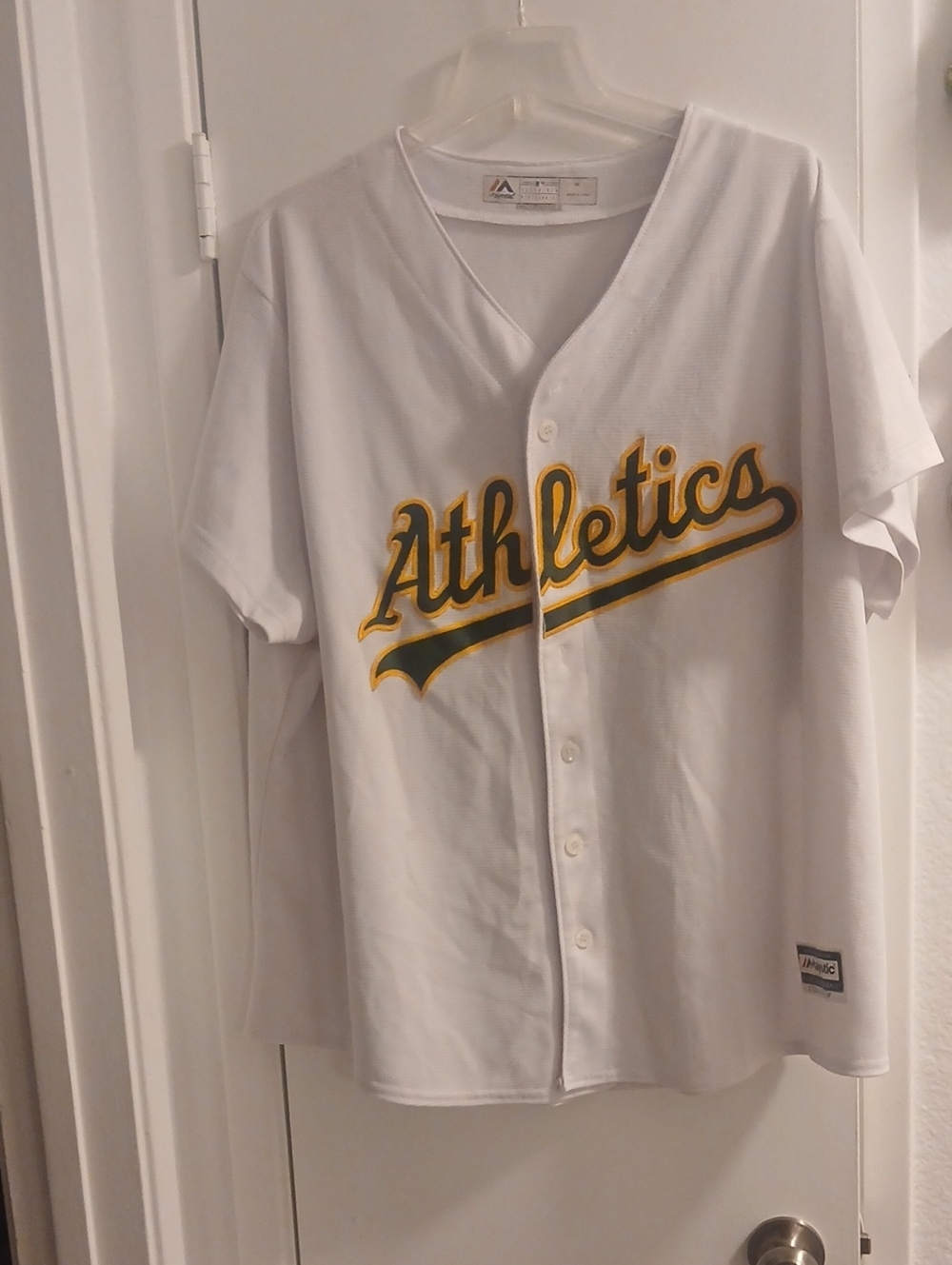 Majestic White Jersey with Yellow & Green Athletics Script